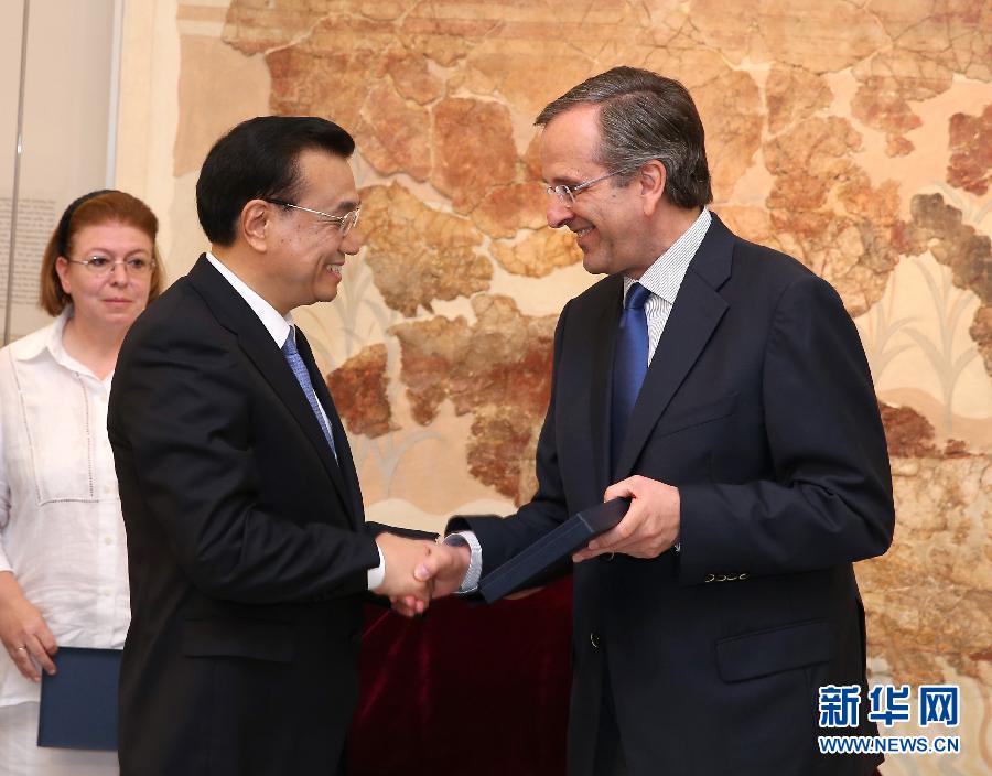 6月21日，國(guó)務(wù)院總理李克強(qiáng)與希臘總理薩馬拉斯共同出席希臘伊拉克利翁博物館新館開館儀式并發(fā)表講話。 新華社記者 龐興雷 攝