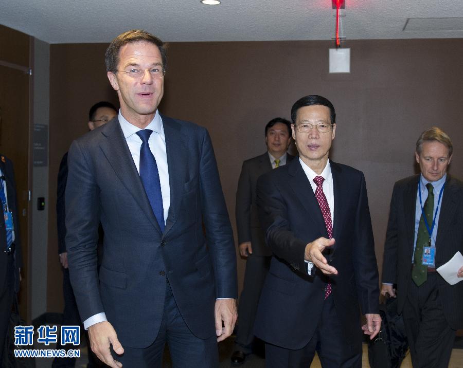 9月23日，出席聯(lián)合國氣候峰會的國家主席習(xí)近平特使、國務(wù)院副總理張高麗在紐約聯(lián)合國總部會見荷蘭首相呂特。 新華社記者 王曄 攝 