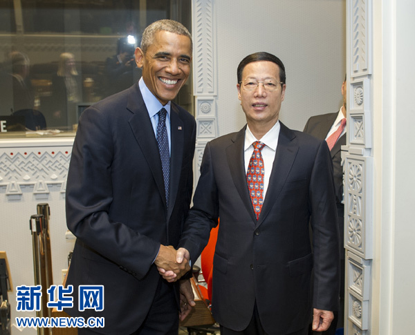 9月23日，國家主席習(xí)近平特使、國務(wù)院副總理張高麗在紐約會見出席聯(lián)合國氣候峰會的美國總統(tǒng)奧巴馬。 新華社記者王曄攝