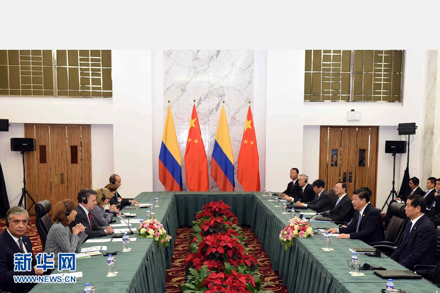 11月18日，國家主席習(xí)近平在菲律賓馬尼拉會見哥倫比亞總統(tǒng)桑托斯。 新華社記者 饒愛民 攝