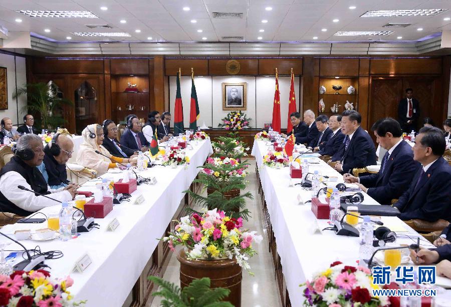 10月14日，國家主席習(xí)近平在達卡同孟加拉國總理哈西娜舉行會談。 新華社記者劉衛(wèi)兵攝 