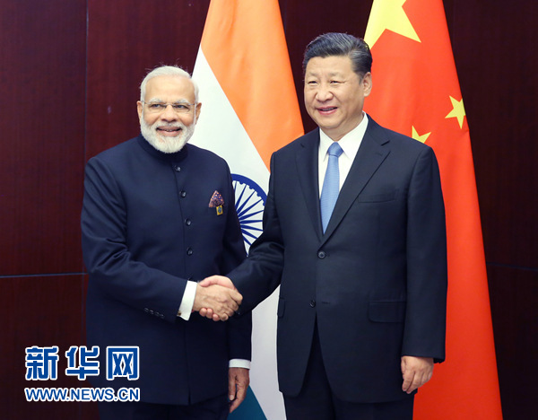 6月9日，國家主席習(xí)近平在阿斯塔納會見印度總理莫迪。 新華社記者姚大偉 攝